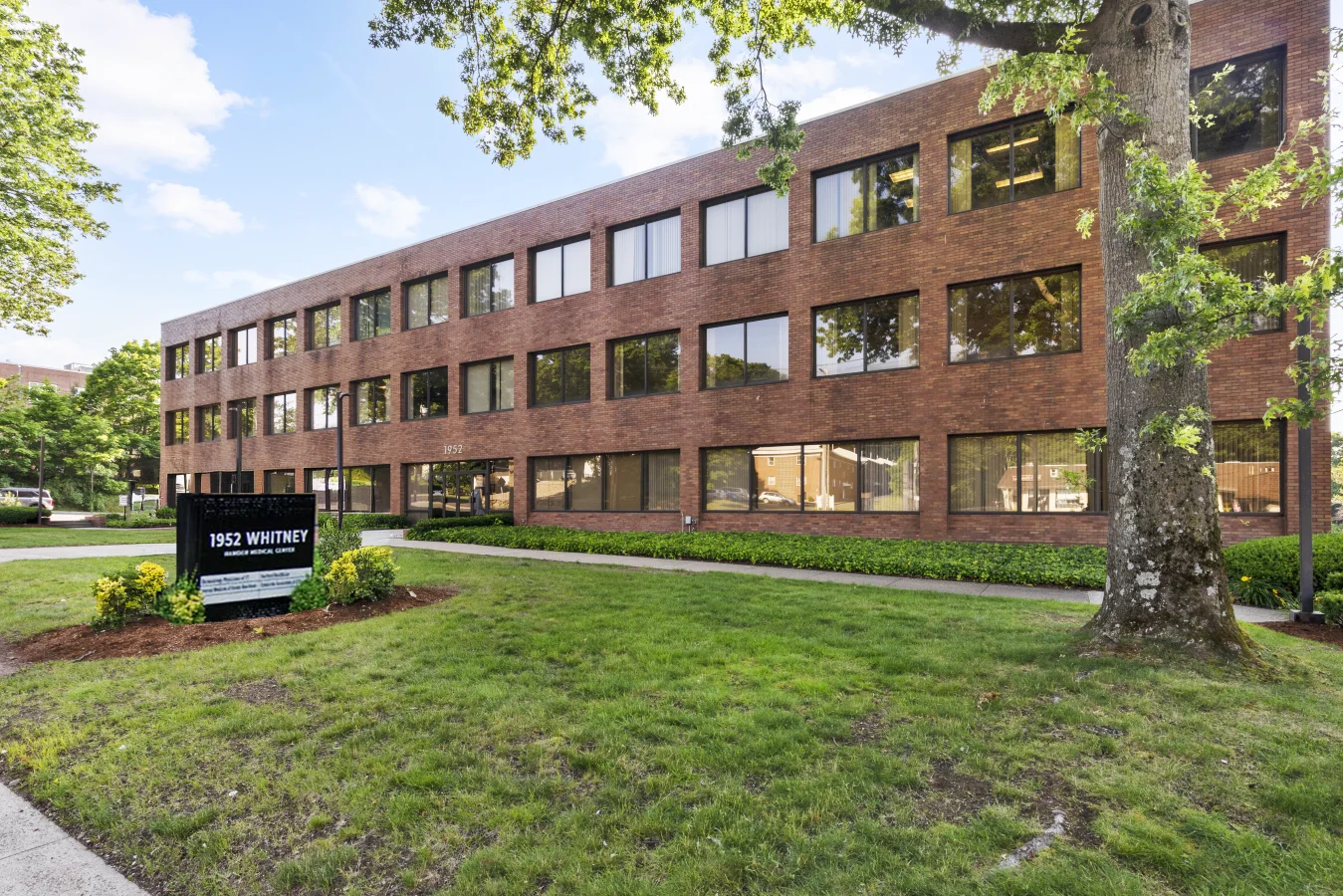 1952 Whitney Ext Photo New Monument Sign 2.webp